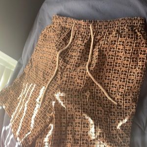 Brown and Black shorts